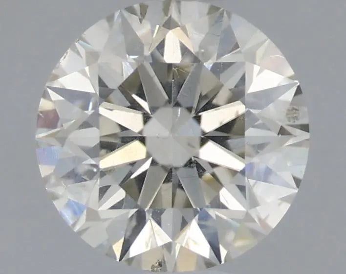 0.60ct Round Natural Diamond (Colour J, Clarity SI2, Cut EX, IGI Certified)