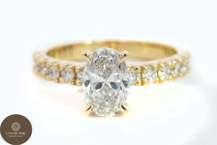 1CT Total Weight - Oval Diamond ring with diamonds on the shank set in 18CT Yellow gold