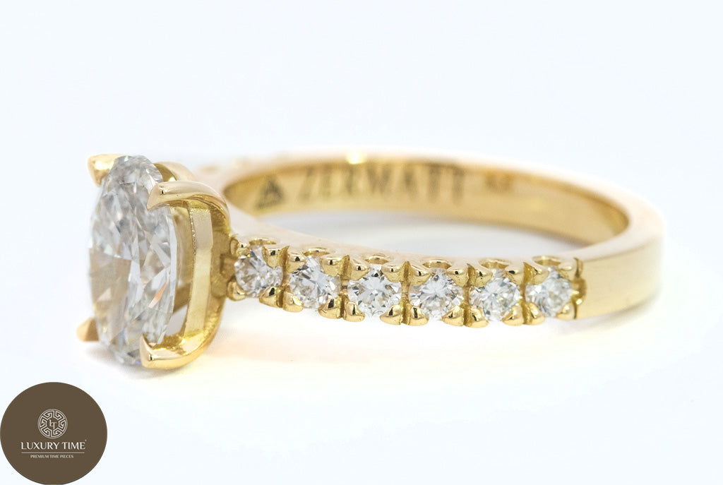 1CT Total Weight - Oval Diamond ring with diamonds on the shank set in 18CT Yellow gold
